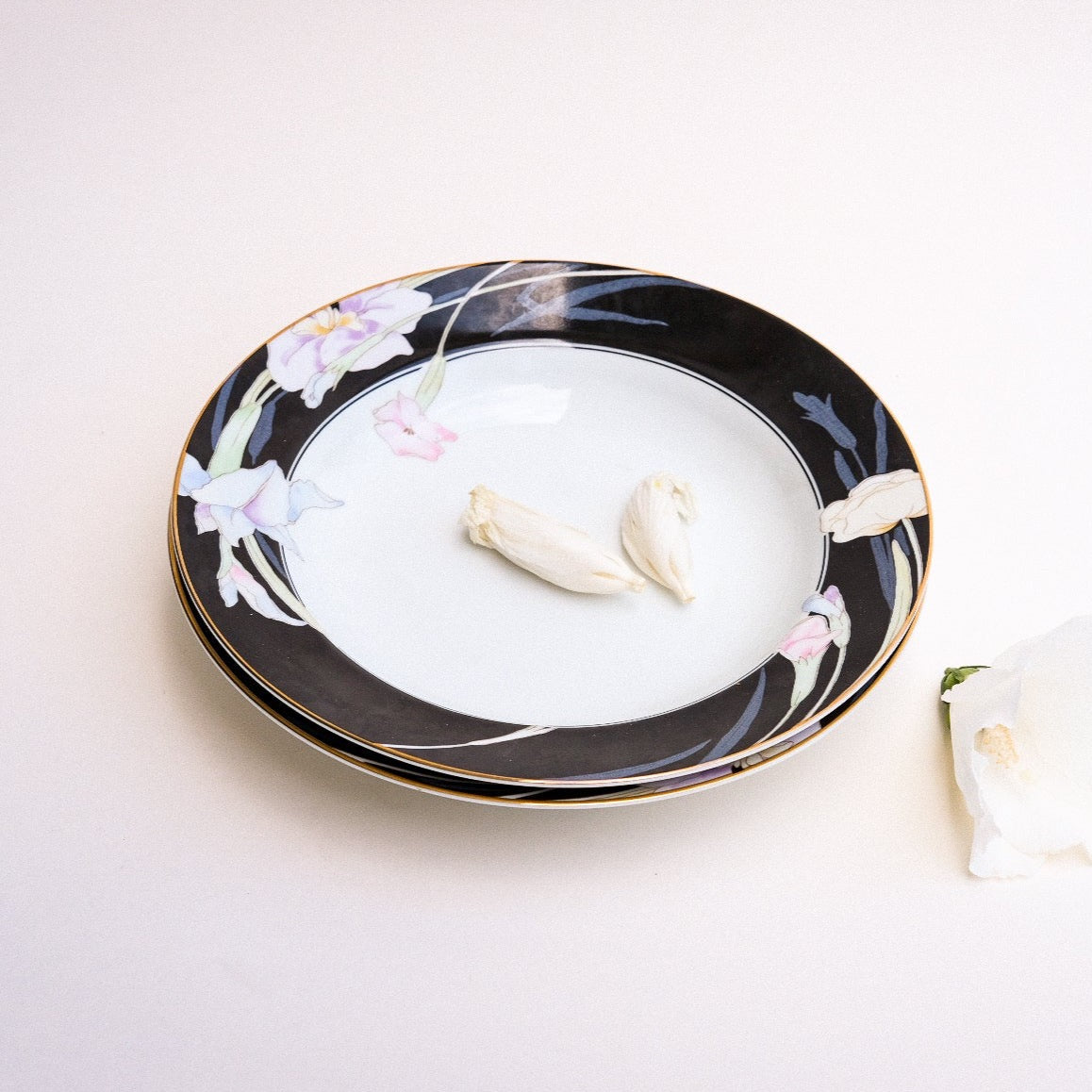 Black and floral plates - set of 4